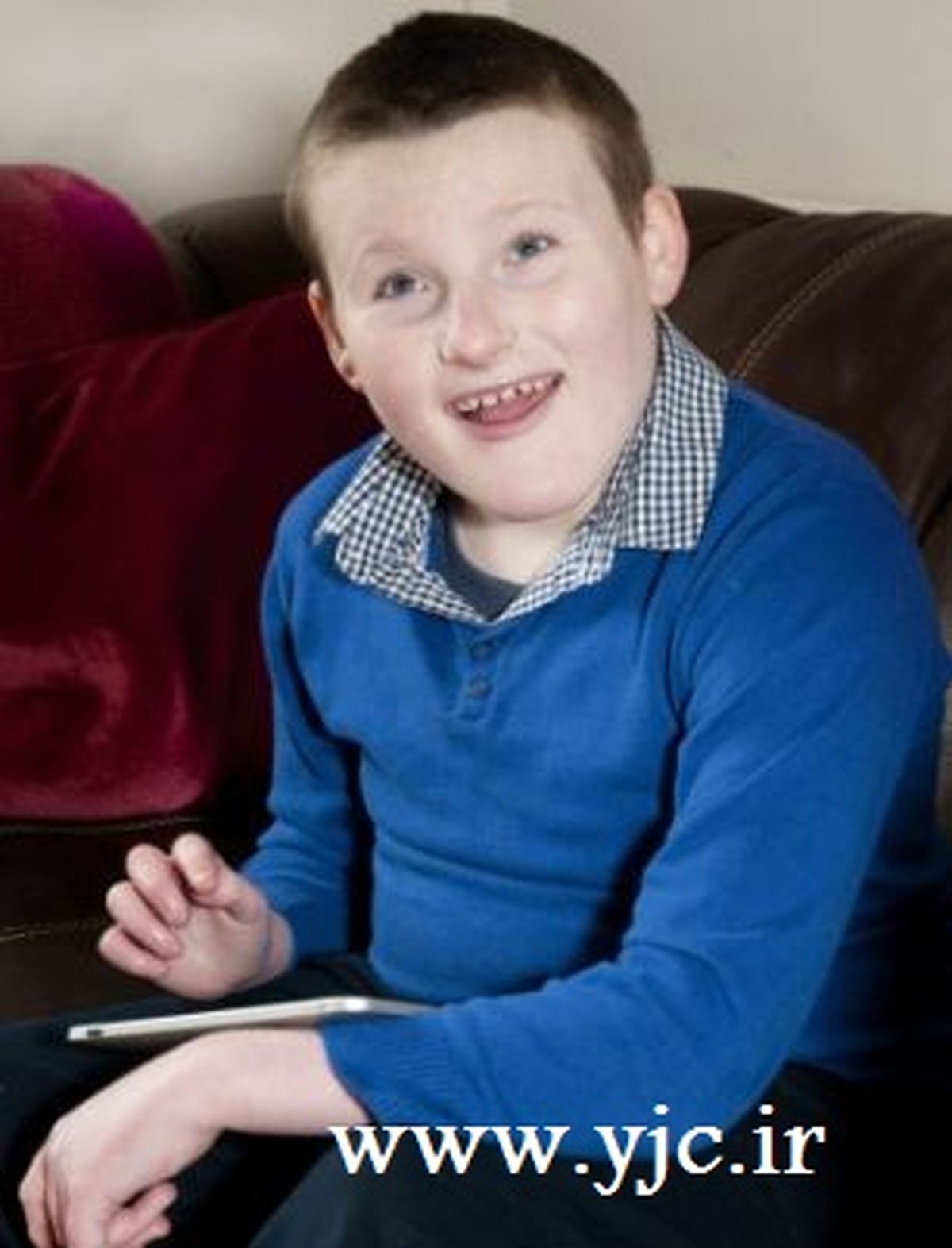 پسری با بیماری خندیدن/عکس