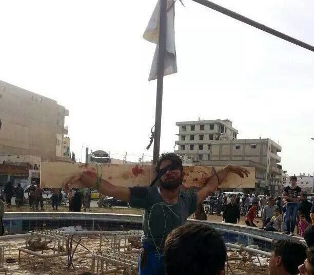 به‌صلیب‌کشیدن‌‌دوسوری‌توسط‌داعش/عکس