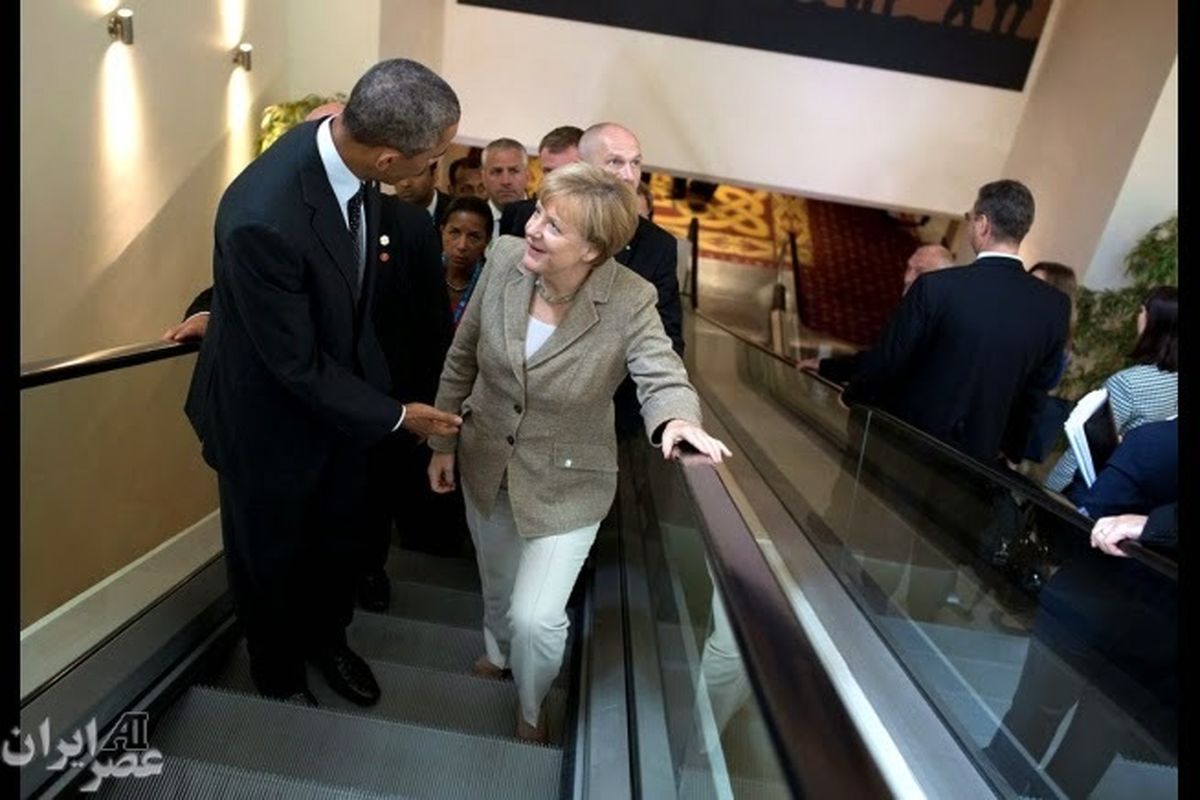 پله برقی سواری اوباما و مرکل/عکس