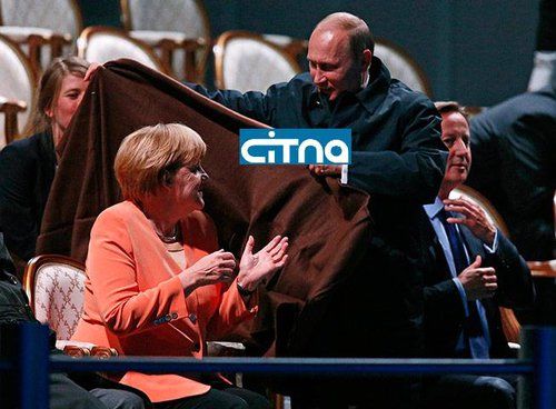 ابراز محبت خاص پوتین به مرکل/عکس