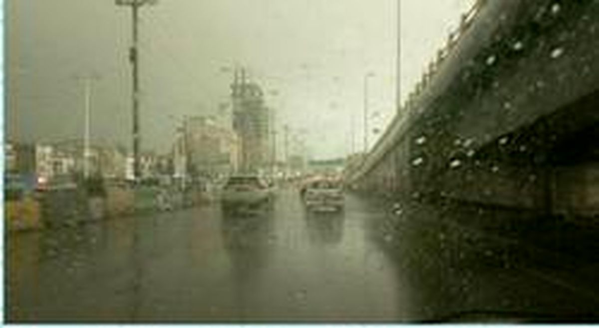 بارش باران هم اکنون در تهران +عکس