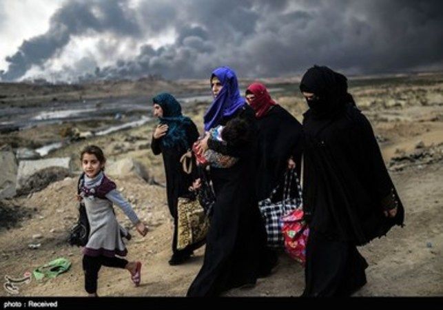تصاویر: فرار شهروندان موصل از چنگال تروریست‌ها