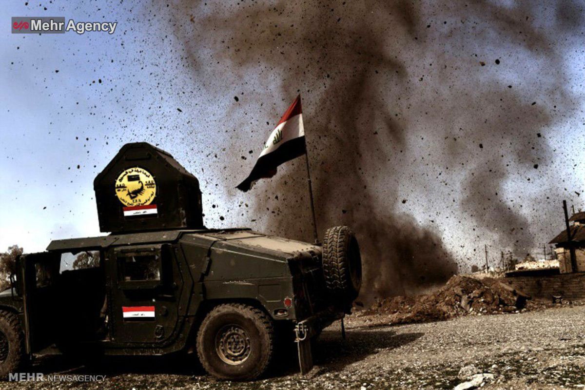 عکس: لحظه انفجار نزدیک یک خودروی نظامی درموصل