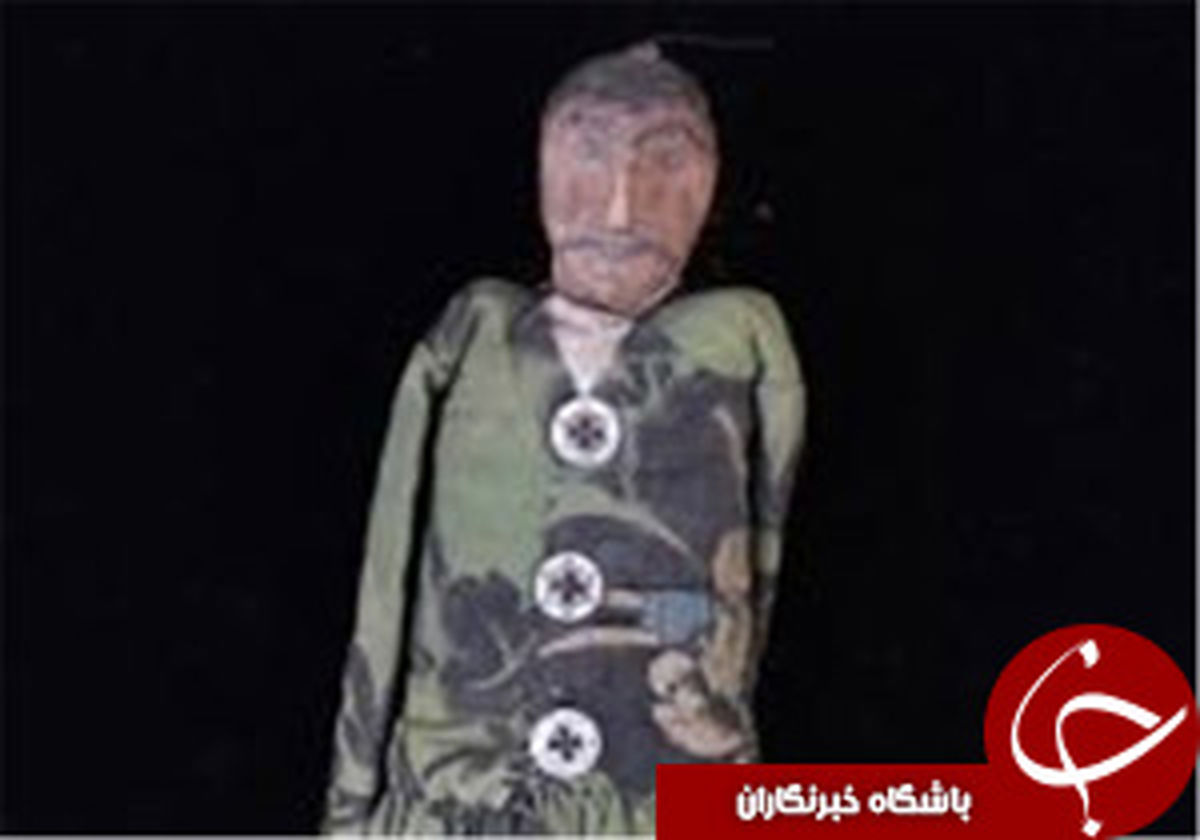 مرمت عروسک ۱۵۰ ساله ایران
