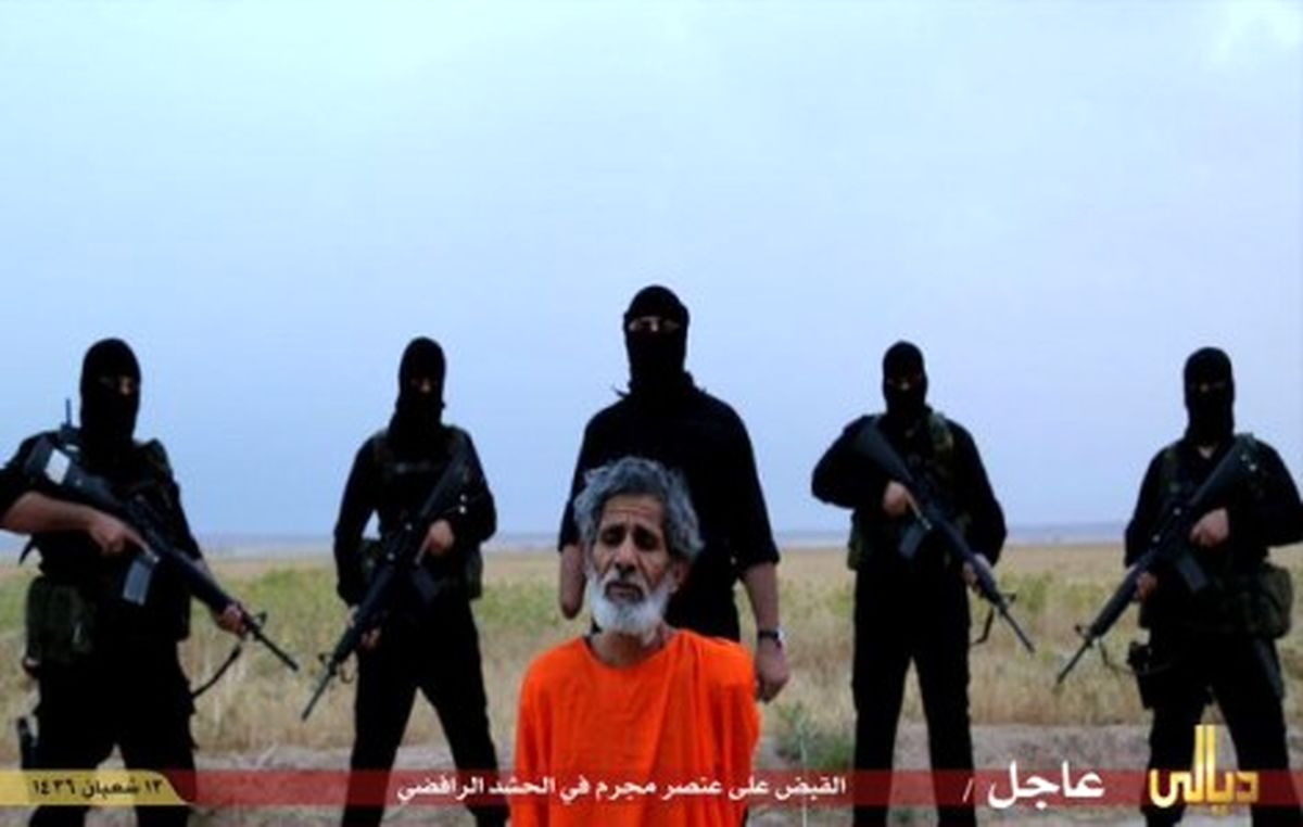 ذبح یک بسیجی عراقی توسط داعش /عکس